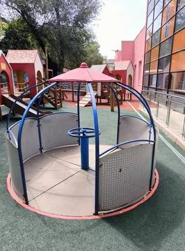 Empty carousel at a modern playground 스톡 사진