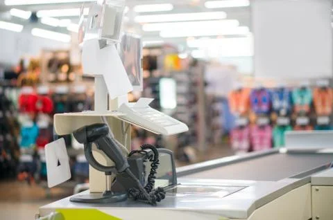 Empty cash desk with computer terinal in supermarket Stock Photos