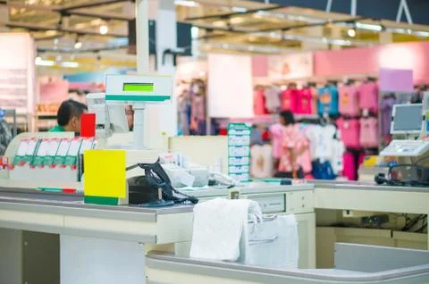 Empty cash desk with computer terminal in mall Stock Photos