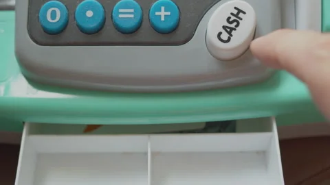 An empty cash register opens when a finger presses the cash button.closeup Stock Footage 248701890