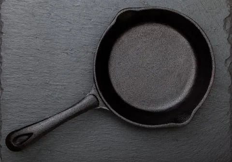 Empty cast iron pan Stock Photos