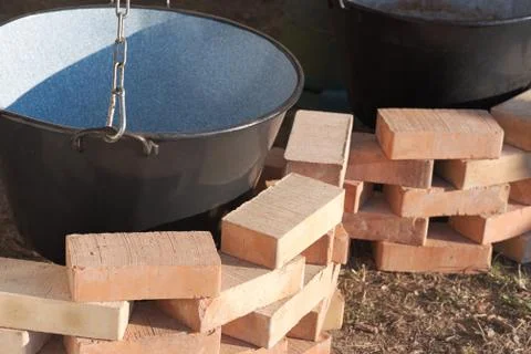 Empty Cauldrons and Bricks Stock Photos