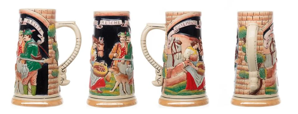 Empty ceramic beer mug with a pattern on a white background. Shot from all si Stock Photos