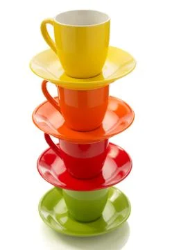 Empty ceramic cup and saucer on white Stock Photos
