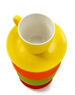 Empty ceramic cup and saucer on white Stock Photos