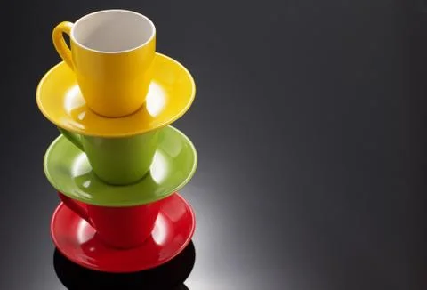 Empty ceramic cup on black Stock Photos