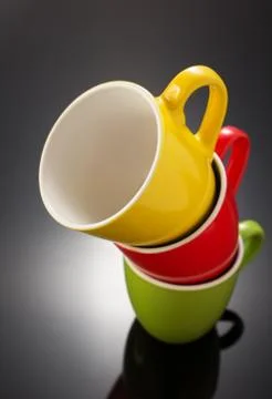 Empty ceramic cup on black Stock Photos