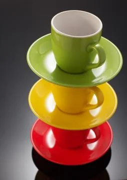 Empty ceramic cup on black Stock Photos