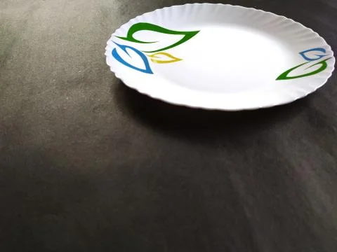 Empty ceramic plate ,black background Stock Photos