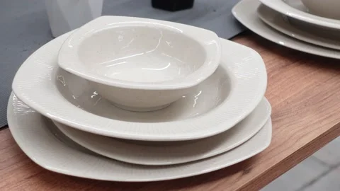 Empty ceramic plate on table , Stock Footage 235560139