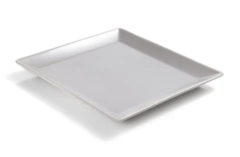Empty ceramic plate on white background Stock Photos