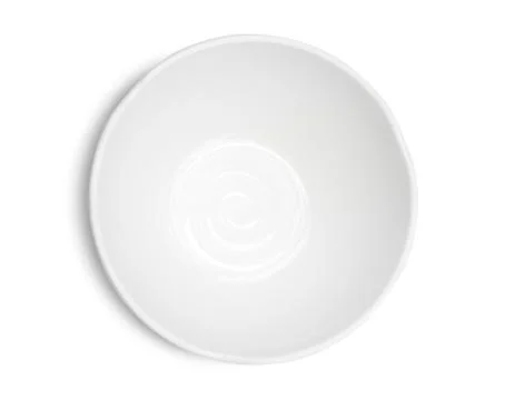 Empty ceramic white plate on white background. Top view Stock Photos