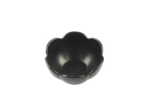 Empty ceramics black plate isolated on white background with clipping path Stock Photos