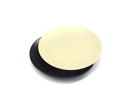 Empty ceramics white and black plate isolated on white background with clip.. Stock Photos