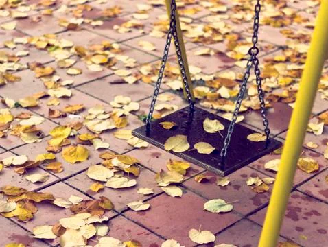 Empty chain swing in playground Stock Photos