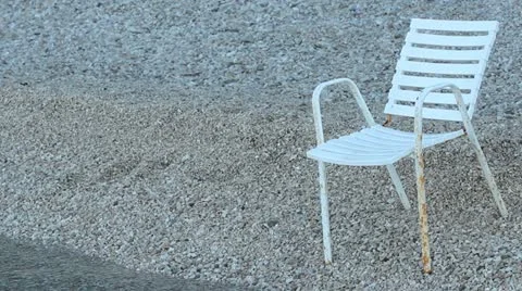 Empty chair on the beach Stock Footage 22303508