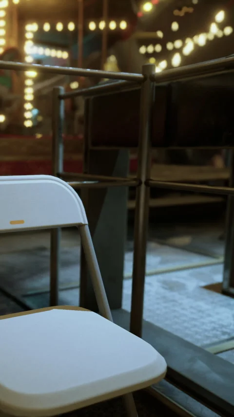 Empty chair in a busy cafe during evening hours with warm lights Stock Footage 339773879