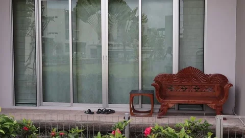 Empty Chair in front of a house Stock Footage 170353770