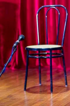 Empty chair with microphone Stock Photos