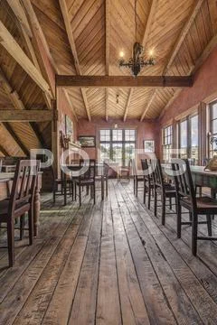 Empty Chairs And Tables In Restaurant