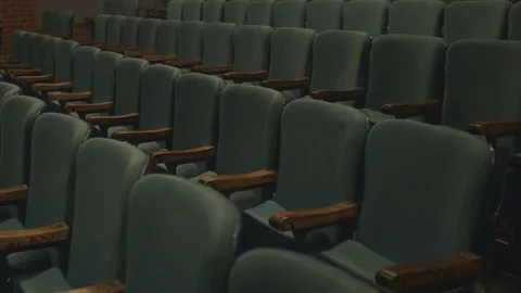 Empty chairs of an auditorium Stock Footage 83860849