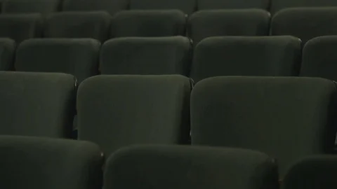 Empty chairs of an auditorium Stock Footage 83860855
