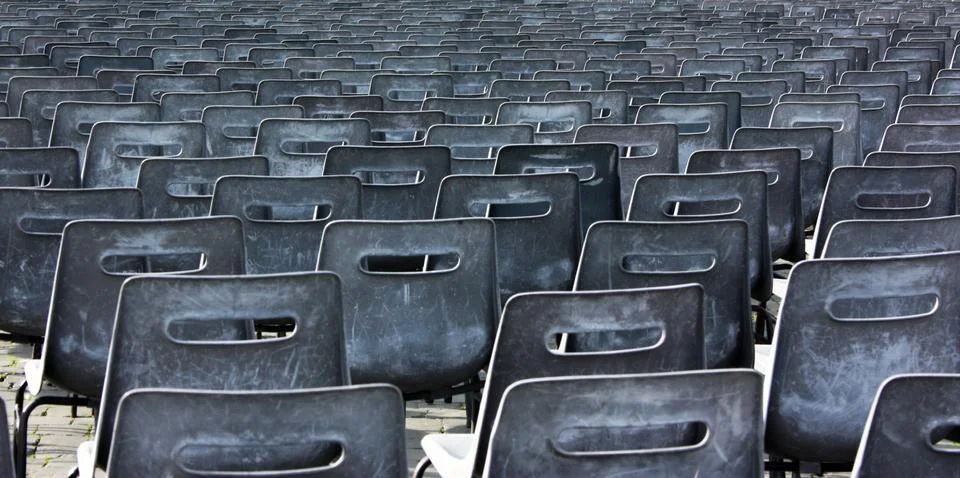 Empty chairs of auditorium Stock Photos