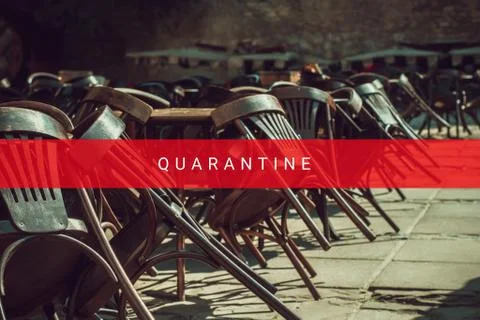 Empty chairs of the closed cafe due the coronavirus Stock Photos