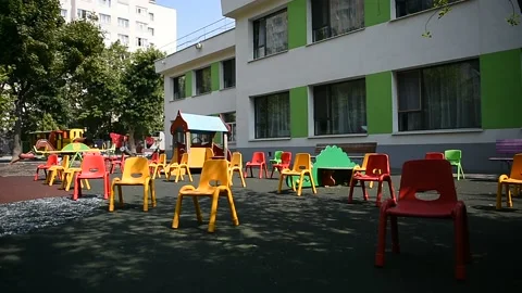 Empty chairs inside a kinder garden play zone during COVID 19 pandemic 스톡 동영상 139806163