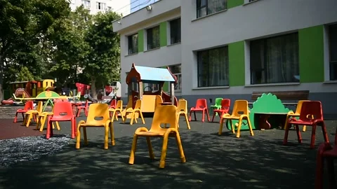 Empty chairs inside a kinder garden play zone during COVID 19 pandemic 스톡 동영상 139806168