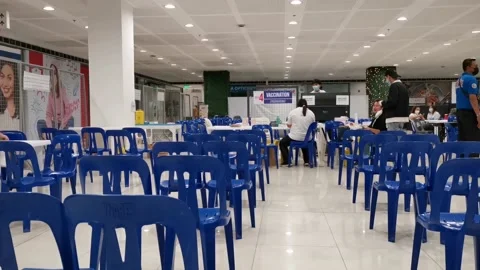 Empty Chairs Inside a Vaccination Area in the Philippines Stock Footage 167042657