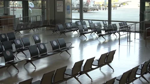 Empty chairs in spacious light hall of contemporary airport Stock Footage 146576154