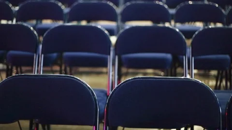 Empty chairs at a venue before a concert Stock Footage 87540765