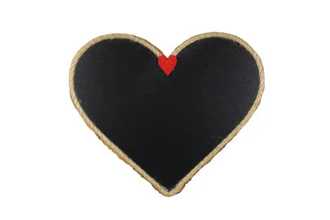 Empty chalkboard texture in heart shape. Stock Photos