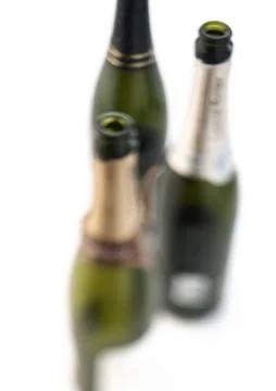 Empty champagne bottles, defocused Stock Photos