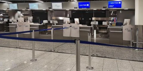 Empty check-in  and drop off counters.Concept of transition to online check in Stock Photos