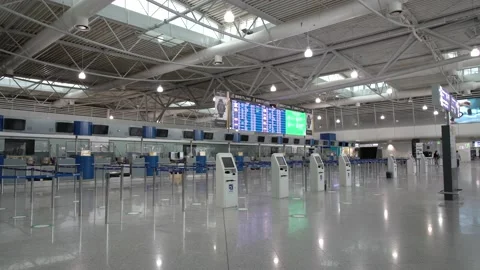 Empty check in counters at Athens Airport Stock Footage 142840091