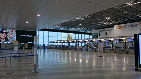 Empty check in desks at Milan Malpensa airport during Covid19 pandemic Stock Footage 154346253