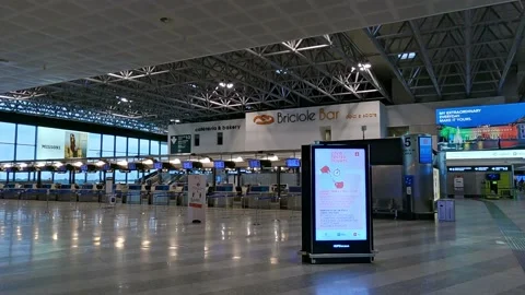 Empty check in desks at Milan Malpensa airport during Covid19 pandemic Stock Footage 154346290