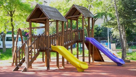 Empty Children Park Due to Corona Virus Precautions - with simultaneous sound Stock Footage 129848896