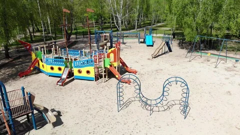 Empty children playground during quarantine by reason of coronavirus covid-19 Stock Footage 129594253
