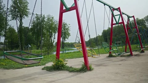 Empty children playground during quarantine. Concept of missing children. Stock Footage 241903207