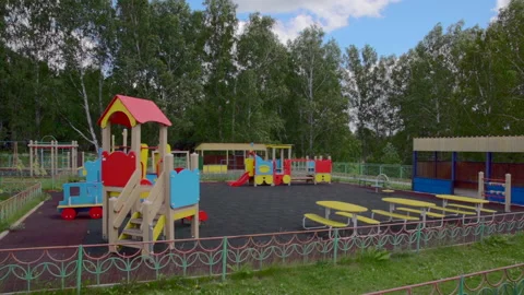 Empty children's playground in the forest Stock Footage 207949922