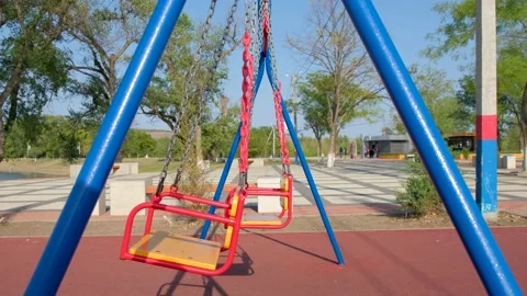 Empty children's swing on chains. Stock Footage 140449630