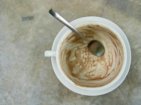 The empty chocolate cup with spoon Stock Photos