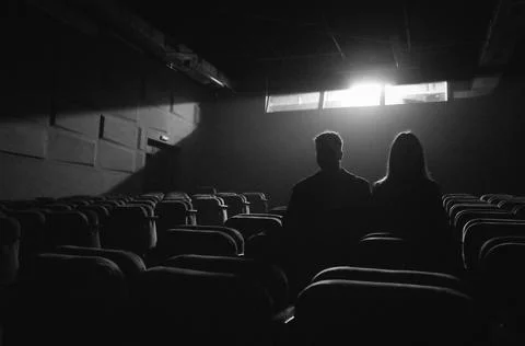 Empty cinema hall Silhouettes of people Love Stock Photos