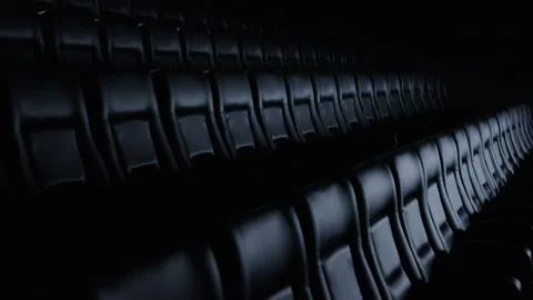An empty cinema hall without an audience. Comfortable leather seats Stock Footage 245809248