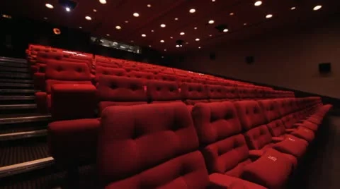 Empty cinema seats with spotlights moving Video stock 19375389