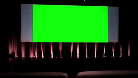 Empty Cinema Theater Green Projection Screen, Dramatic Stage Lighting Zoom 库存影片 336677415