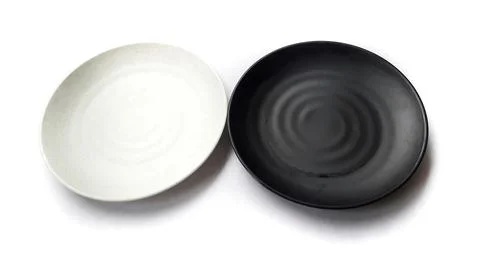 Empty circle white and black plates with ceramic melamin material Stockfoto's